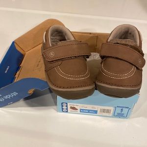Baby moccasin Stryker shoe. Velcro strap slip on!